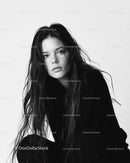 Black and White Portrait of a Young Woman with Long Wet Hair