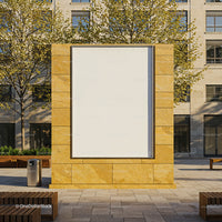 Empty urban billboard framed by stone wall in plaza