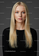 Portrait of calm blonde woman in black sweater