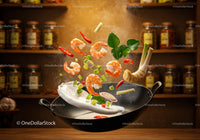 Fresh Shrimp and Aromatic Herbs Flying Over Wok
