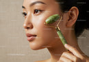 Young Woman Using Jade Roller for Facial Massage and Skincare