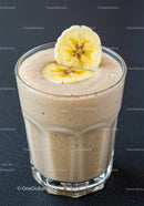 Creamy banana smoothie topped with dried banana slices