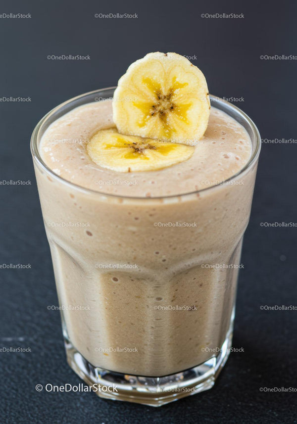 Creamy banana smoothie topped with dried banana slices