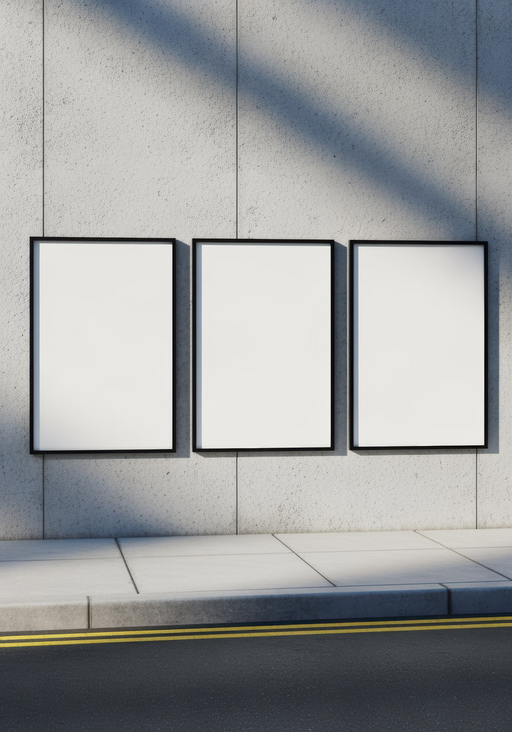 Three Blank Vertical Posters on Urban Concrete Wall