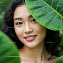 Portrait of a Smiling Woman in Lush Green Tropical Garden