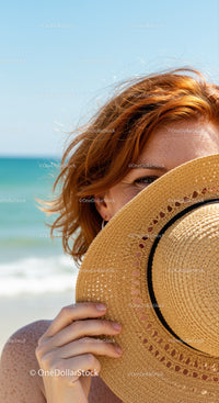 Red Haired Woman Wearing Straw Sunhat at the Beach