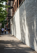 City Sidewalk Scene with Pedestrians and Urban Architecture