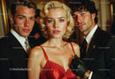 Elegant Lady in Red Dress with Two Men in Tuxedos at Night Event