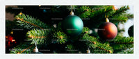 Close-up of decorated Christmas tree with baubles