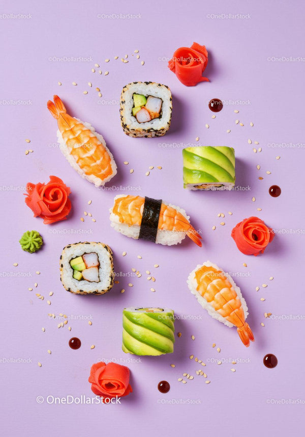 Colorful sushi platter with shrimp and avocado rolls