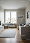 Bright Modern Living Room with Beige Walls and Wooden Floors