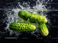 Fresh Green Cucumbers Splashing Water for Healthy Eating