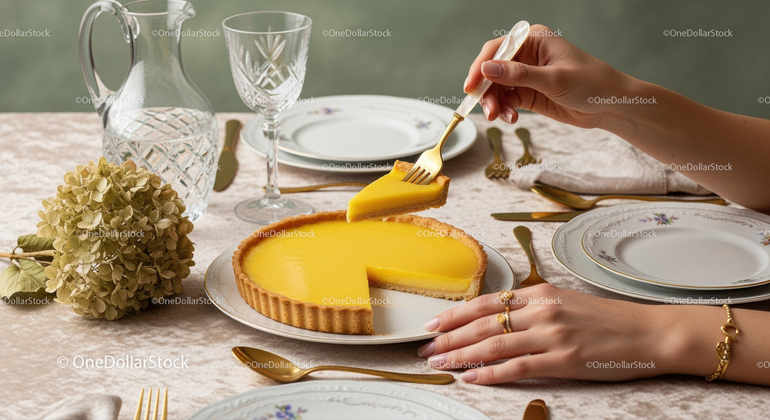 Elegant Lemon Tart with Gold Cutlery and Vintage China
