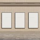 Three Blank Vertical Posters on Beige Stone Wall
