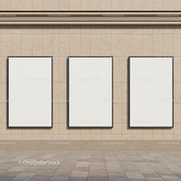 Three Blank Vertical Posters on Beige Stone Wall