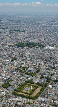 Aerial View of a Dense Urban City with Parks and Skyscrapers