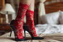 Chic Black Heels and a Red Lace Dress in a Cozy Bedroom Setting