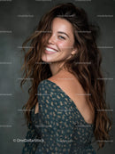 Beautiful Smiling Woman with Curly Hair in Patterned Dress
