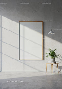 Minimalist room with blank frame and green plant decor
