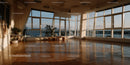 Interior of Modern Large Floor-to-Ceiling Windows Dance Studio with Scenic City View