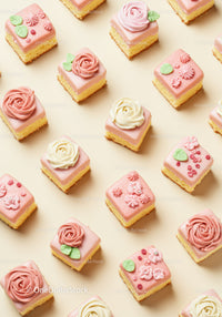 Assorted Mini Cakes with Floral Buttercream Decorations
