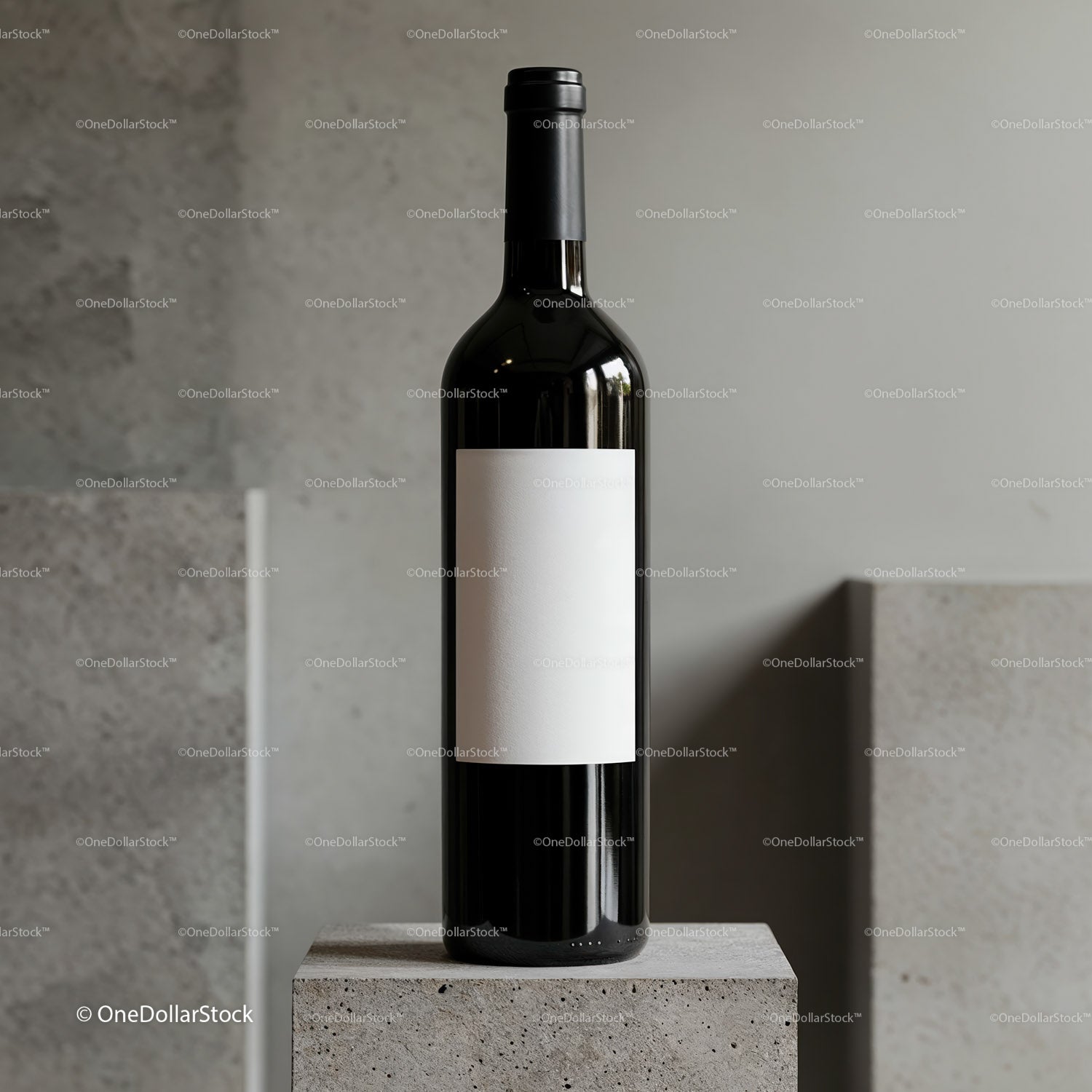Elegant wine bottle with blank label on stone pedestal