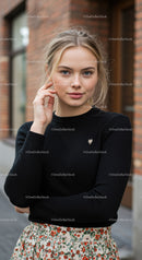 Young Woman with Blonde Hair and Blue Eyes in Casual Outdoor Outfit
