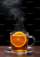 Steaming Black Tea with Fresh Orange Slice in Glass Cup