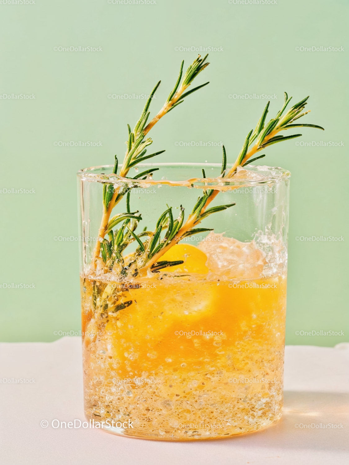 Refreshing Citrus Cocktail with Rosemary Garnish