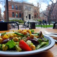 Colorful Vegetable Salad with Chickpeas and Tomatoes in Urban Cafe