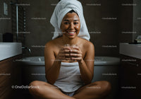 Young Woman Smiling with Glass of Water During Spa Self-Care Routine