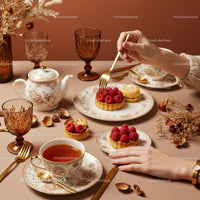 Elegant Afternoon Tea with Raspberry Tartlets and Vintage China