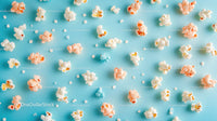 Colorful Popcorn on Light Blue Background