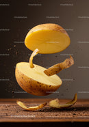 Sliced potato halves floating with skin peeling