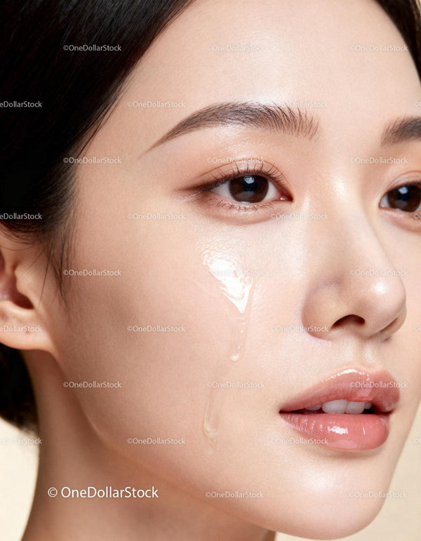 Close up of radiant woman with clear hydration drops
