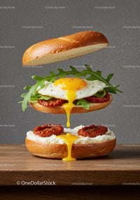 Fresh sandwich with fried egg and sun-dried tomatoes