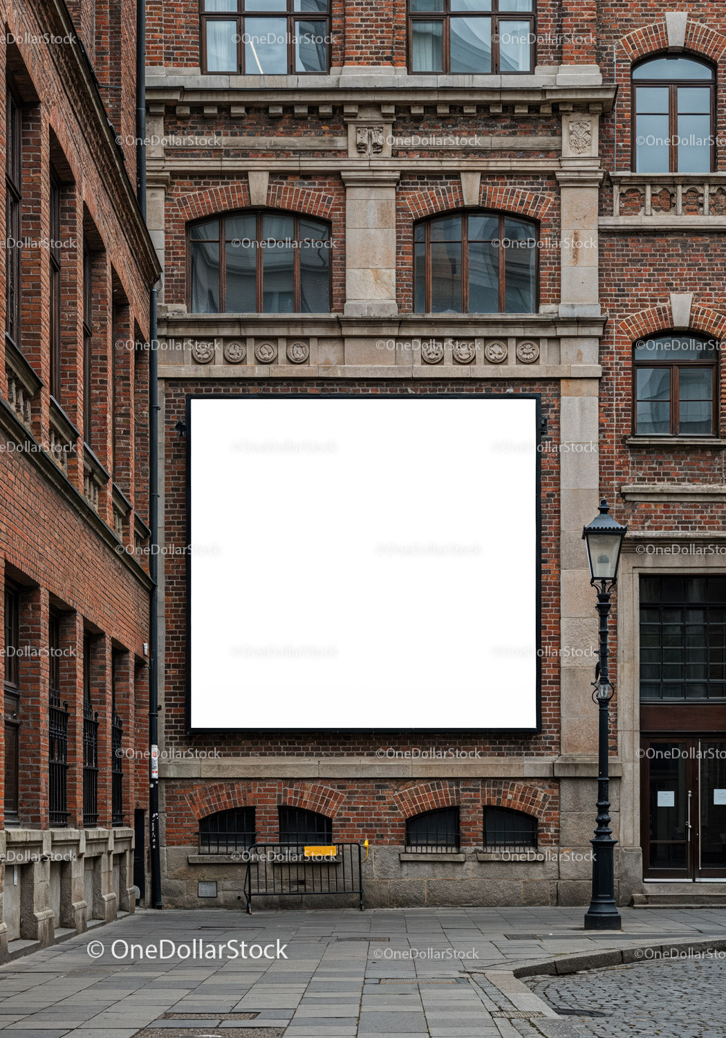 Empty billboard on historic brick building facade