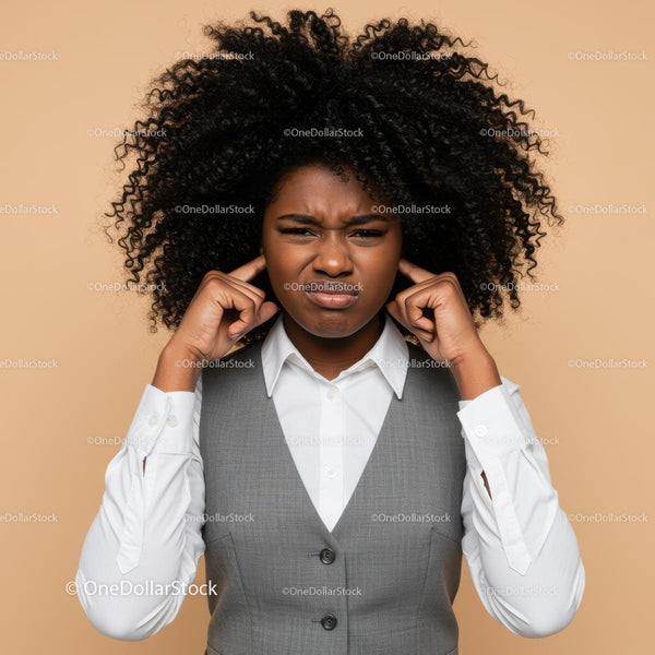 Confused Young African American Woman Covering Her Ears with Frustrated Expression