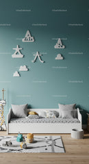 Modern Baby Nursery with Cloud and Star Wall Decorations and Cozy Decor