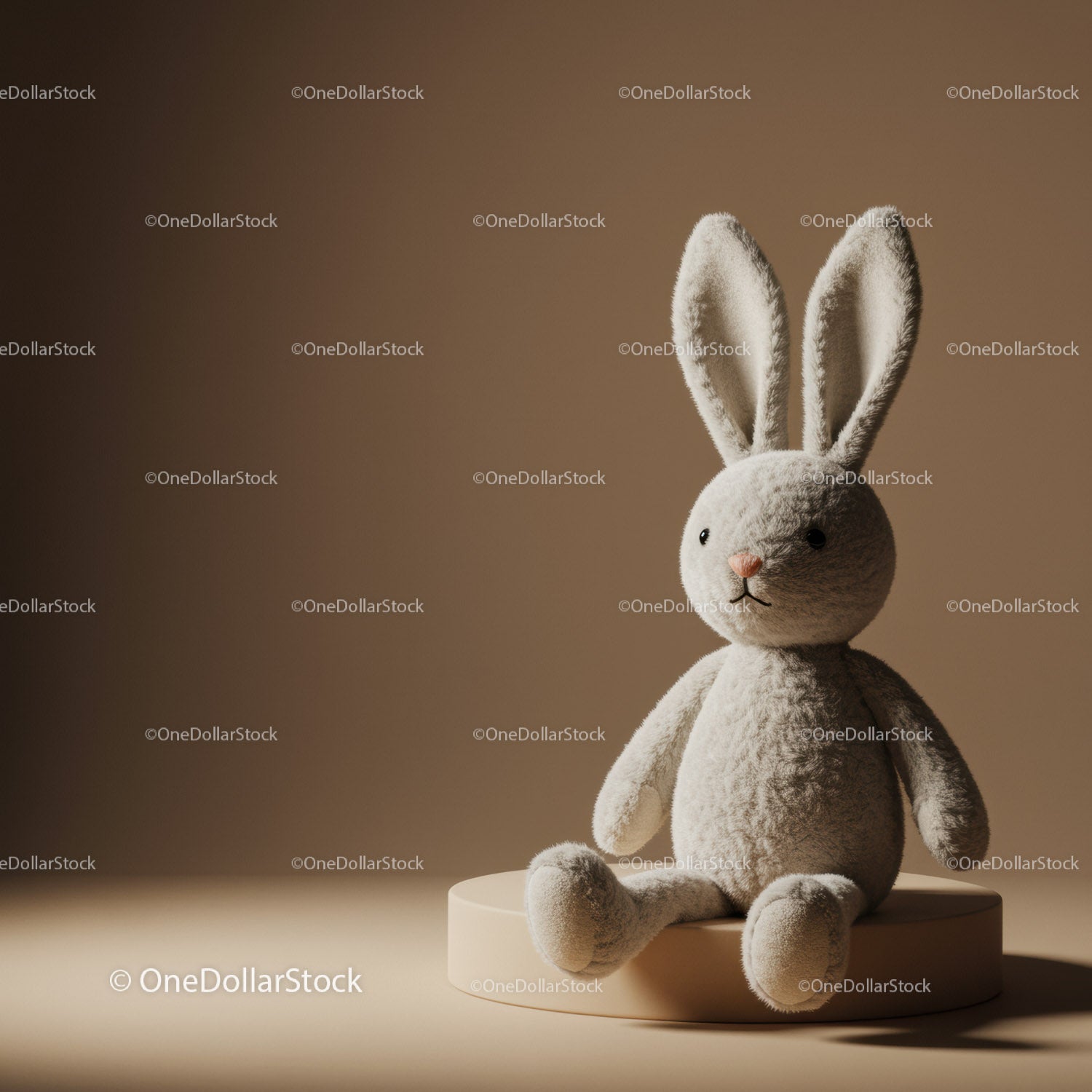 Soft Plush Bunny Sitting on Round Beige Pedestal