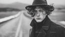 Moody Black and White Portrait of a Young Man with Windblown Hair