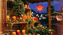 Festive Christmas Market Stall with Candles and Wreaths