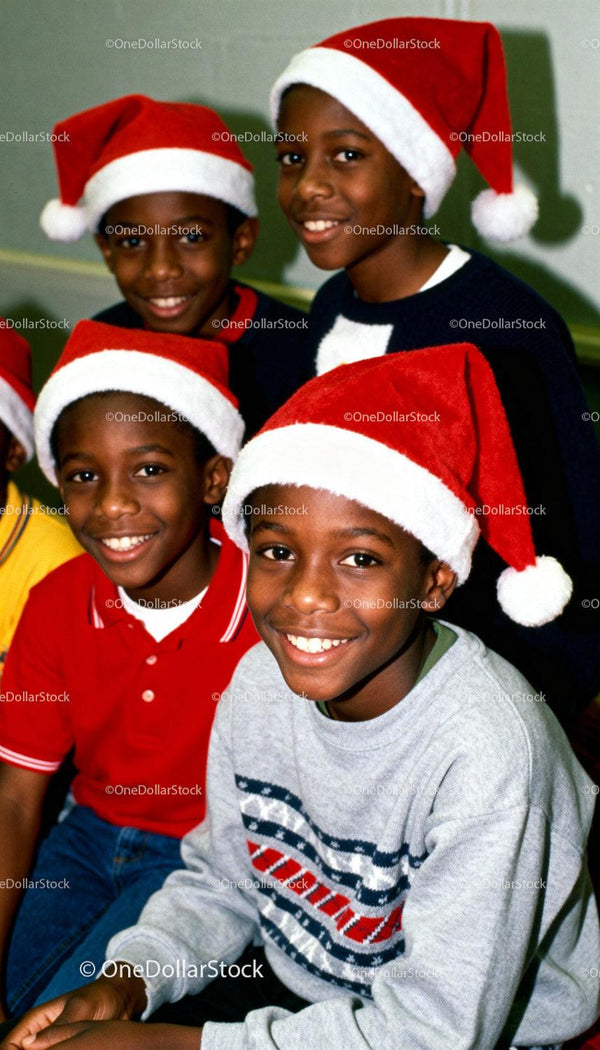 Happy Boys Wearing Santa Hats Celebrating Christmas