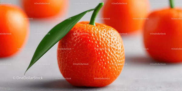 Vivid Fresh Orange Tangerines with Green Leaf on White Surface