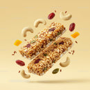 Healthy granola bars with nuts and dried fruits floating