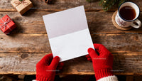 Hands in Red Gloves Holding Blank Christmas Card on Wood JPG Mockup Image preview
