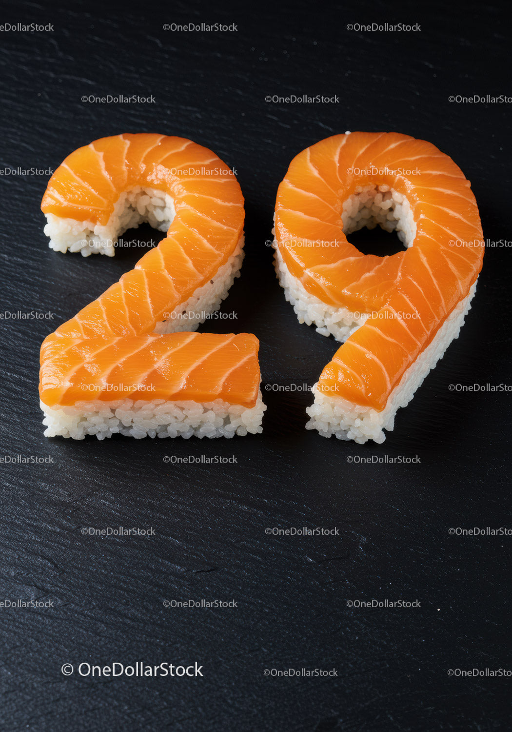Sushi z łososia w kształcie cyfry dwadzieścia dziewięć na czarnym łupku