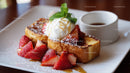 Sweet French Toast with Strawberries and Cream on White Plate