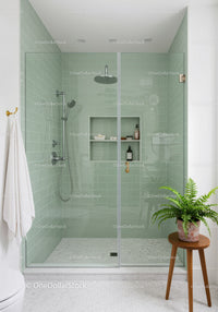 Modern green tiled walk in shower with glass doors