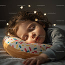 Peaceful child sleeping with decorative stars around head